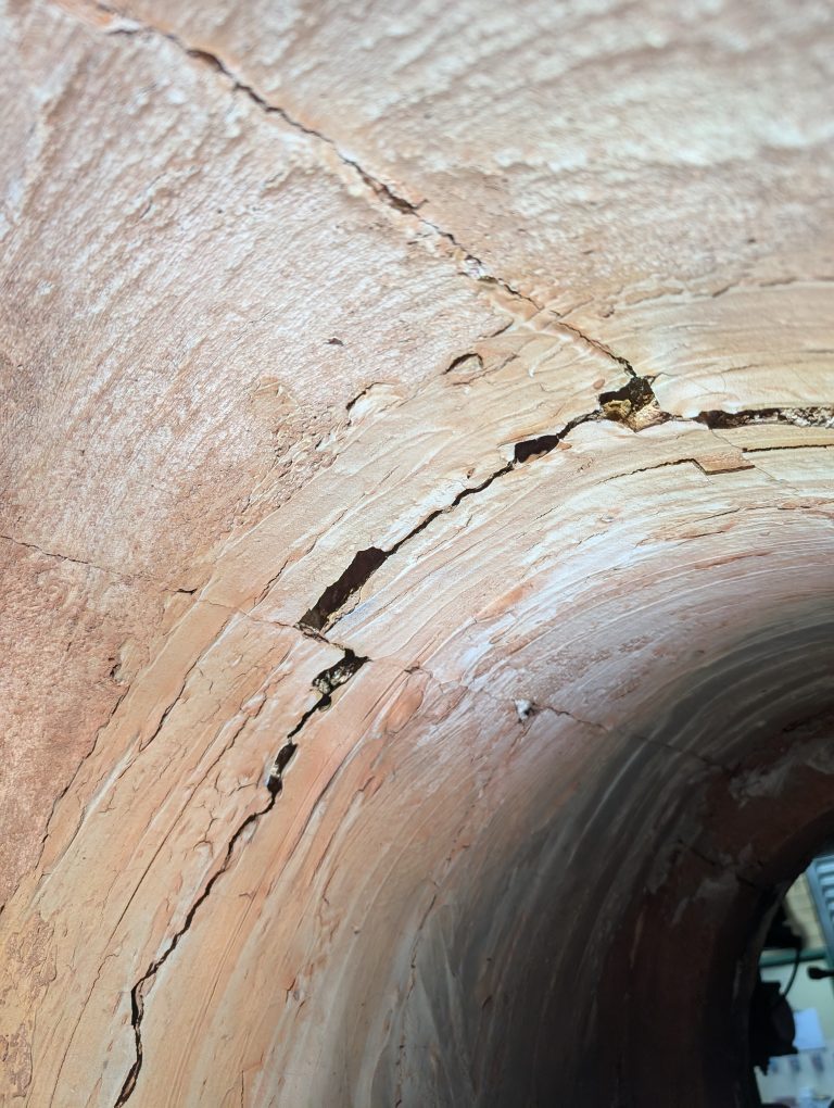 A deep crack shown within the quarl of a burner.